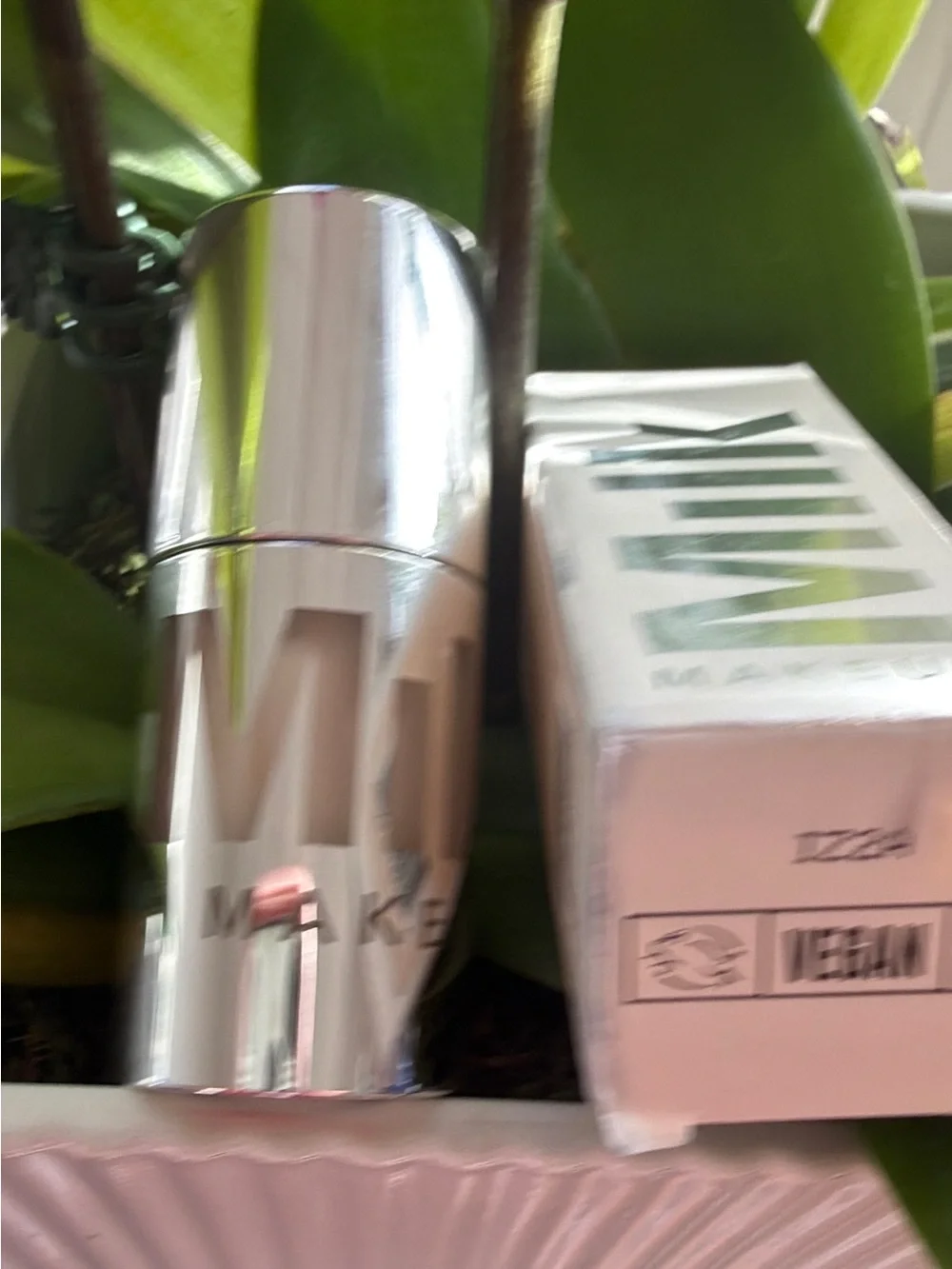 Milk Makeup Primer Stick in Shiny Silver Case with Soft Pink Box